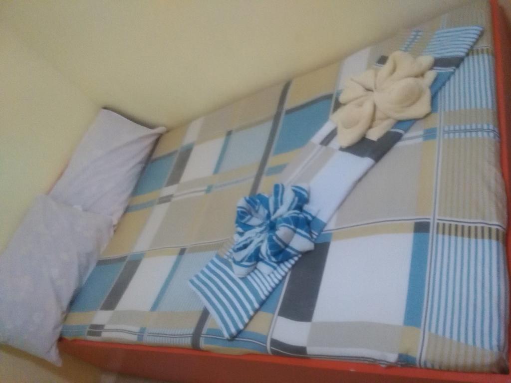 Aranas-Carillo Travellers Inn Kalibo Habitación foto