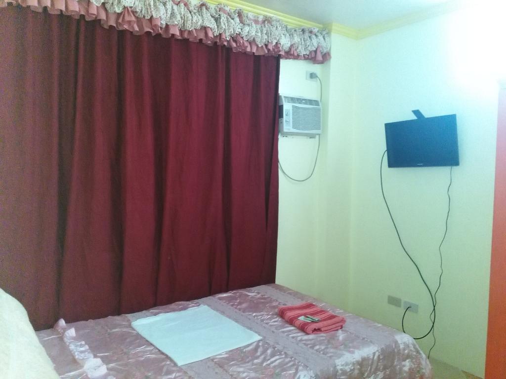 Aranas-Carillo Travellers Inn Kalibo Habitación foto